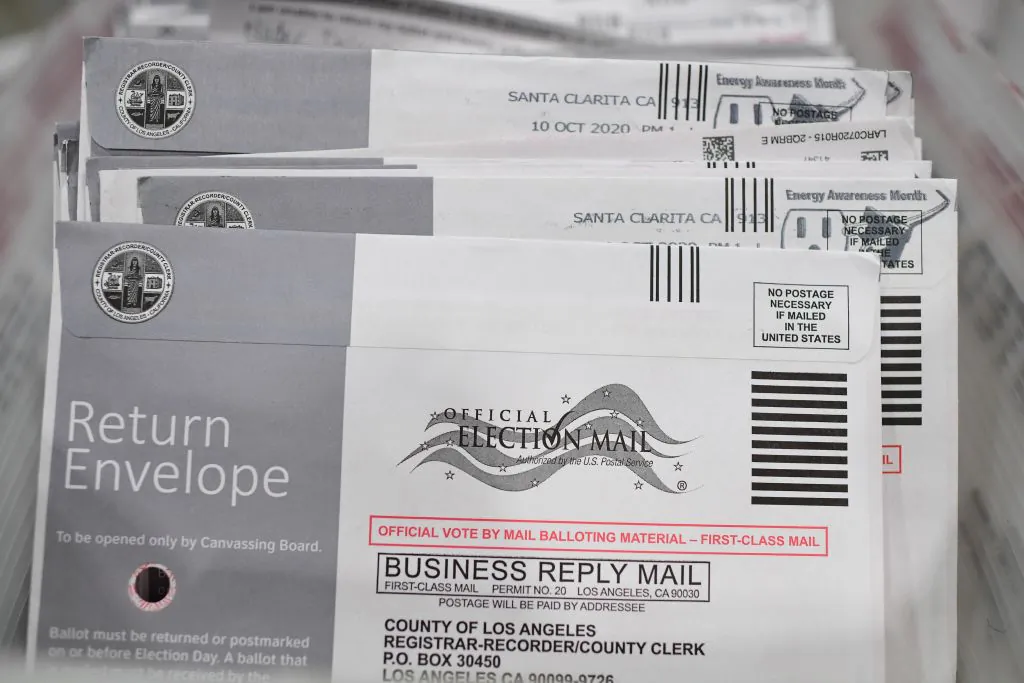 Mail-in ballots in their envelopes await processing at the Los Angeles County Registrar Recorders' processing center in Pomona, Calif., on Oct. 28, 2020. (Robyn Beck/AFP via Getty Images)