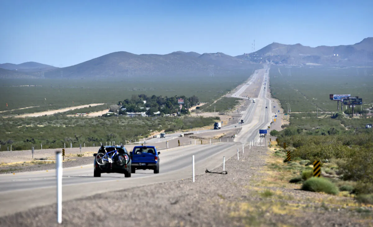 Motorists travel along U.S. Highway 95 near the town of Cal-Nev-Ari, Nev. on May 15, 2016. (David Becker/AFP via Getty Images)