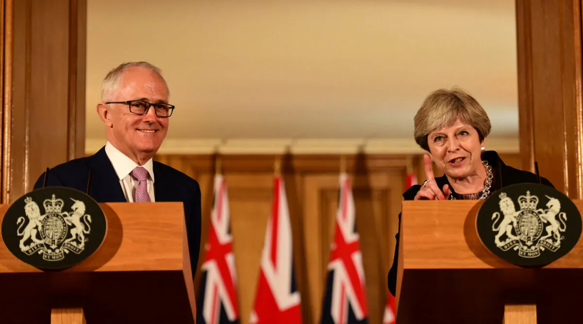 Australia's then Prime Minister Malcolm Turnbull and his British counterpart Theresa May speak at a press conference in 10 Downing Street in central London, on July 10, 2017. (Hannah Mckay/AFP via Getty Images)