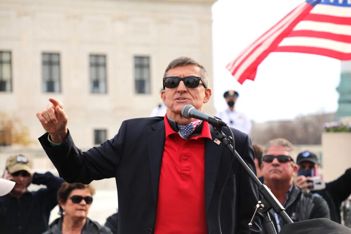 Retired Lt. Gen. Mike Flynn speaks among President Donald Trump supporters who rally in Washington on Dec. 12, 2020. (Yong Wang/The Epoch Times)