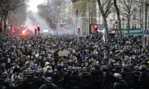 Thousands Protest Macron's Security Bill in Paris, Over 100 Arrested