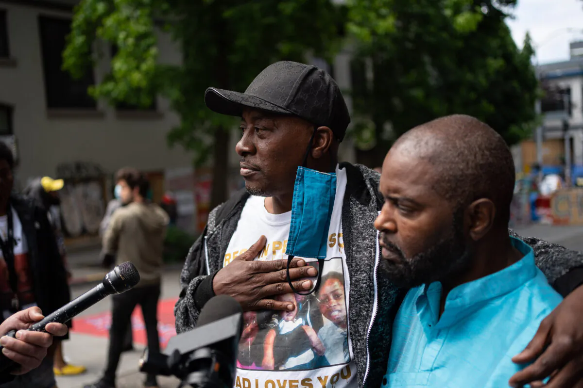 Horace Lorenzo Anderson (L) speaks about his son, Lorenzo Anderson, who was killed near a so-called autonomous zone in Seattle, Wash., in a June 29, 2020, file photograph. (David Ryder/Getty Images)