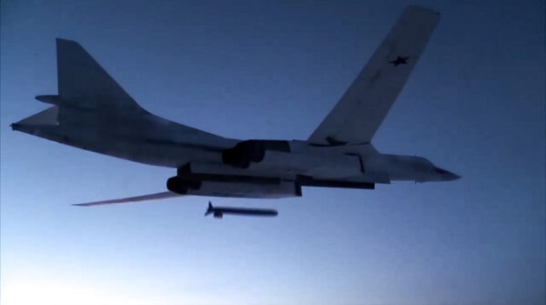 A Russian Tu-160 strategic bomber fires a cruise missile