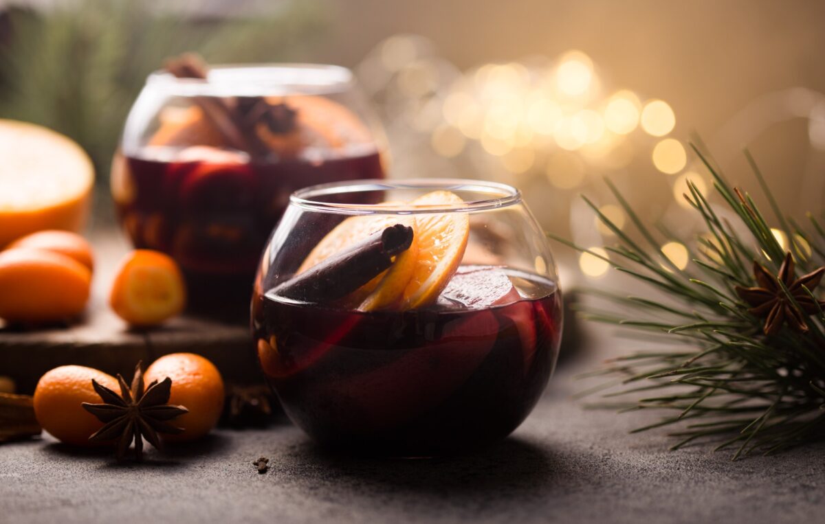 Who wouldn't want to curl up with a fragrant mug of vino—especially one fortified with spirits and fruit, laced with cinnamon and spice? (Sokor Space/Shutterstock)