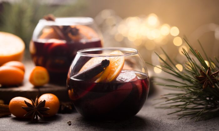 Who wouldn't want to curl up with a fragrant mug of vino鈥攅specially one fortified with spirits and fruit, laced with cinnamon and spice? (Sokor Space/Shutterstock)