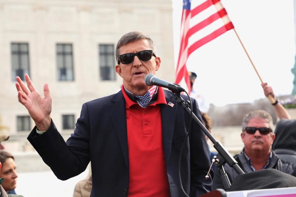 Retired Lt. Gen. Mike Flynn speaks among President Donald Trump supporters who rally in Washington, on Dec. 12, 2020. (Yong Wang/The Epoch Times)