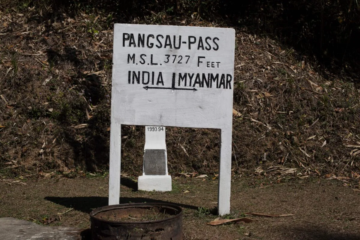 A sign on the border between Burma (also known as Myanmar) and India at Pangsau Pass, Saigang state, northern Burma, on Feb. 19, 2014. (Findlay Kember/AFP via Getty Images)