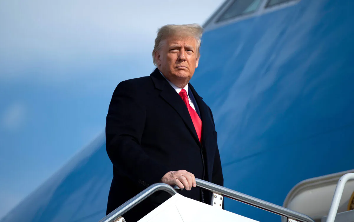 President Donald Trump boards Air Force One at Joint Base Andrews in Maryland on Dec. 12, 2020. (Brendan Smialowski/AFP via Getty Images)