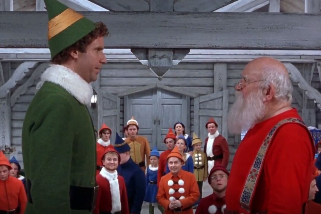 Big “elf’ Buddy  (Will Ferrell, L) and Santa (Ed Asner) in “Elf.” (New Line Cinema)