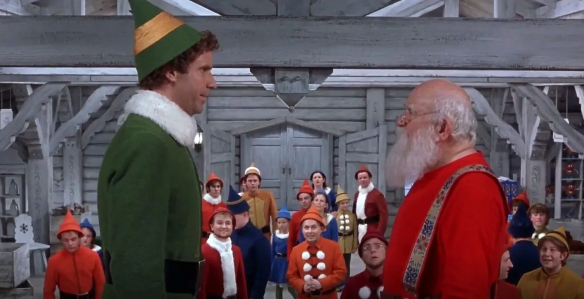 Big “elf’ Buddy  (Will Ferrell, L) and Santa (Ed Asner) in “Elf.” (New Line Cinema)
