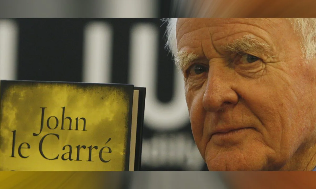 British author John le Carre holds a copy of his new book entitled 'Our Kind of Traitor' at a central London bookstore during a book signing event to mark the launch of the novel in London, on Sept. 16, 2010. John le Carre, the spy-turned-novelist, has died aged 89. (Alastair Grant/AP Photo)