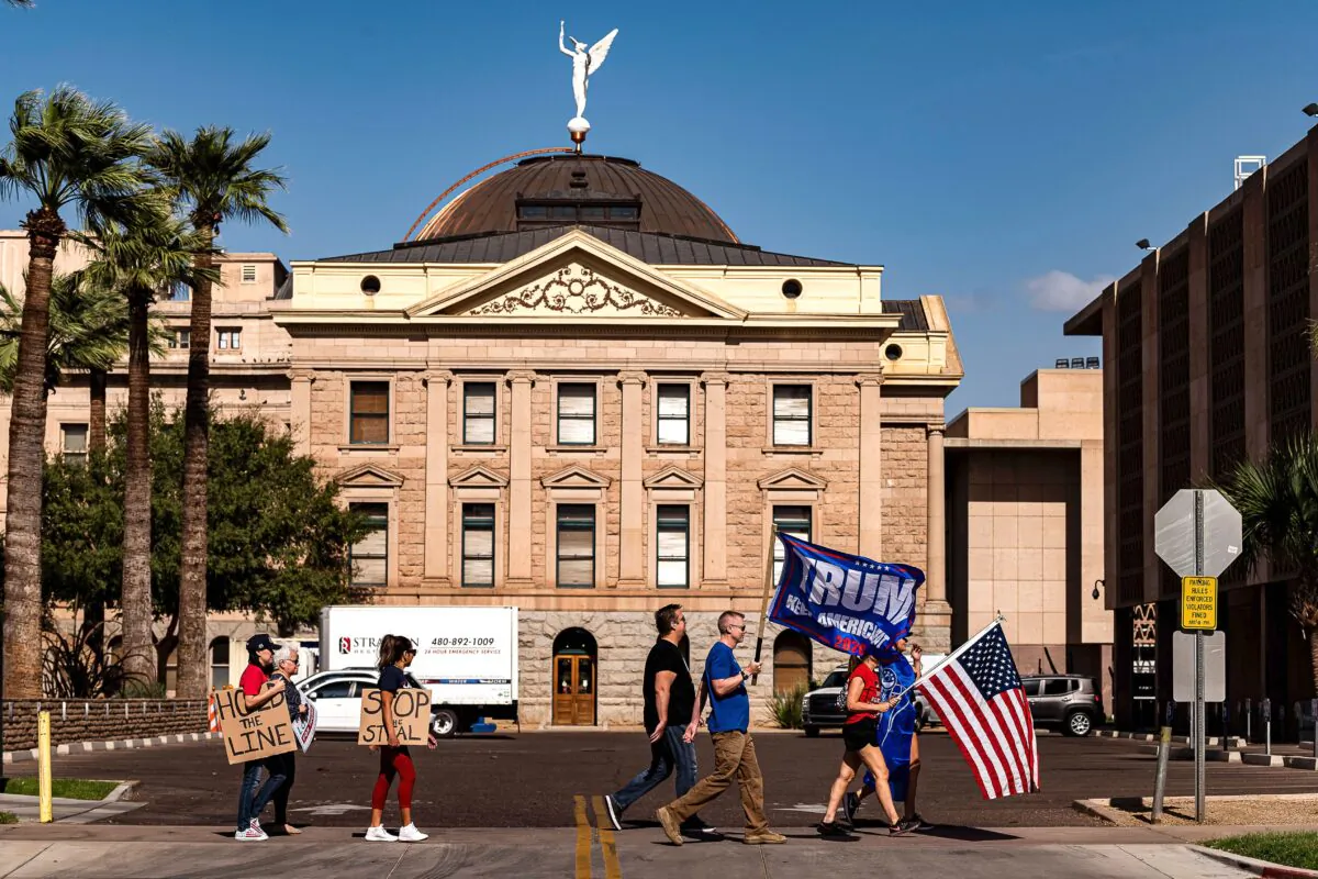 Supporters of President Donald Trump demonstrate in front of the Arizona State Capitol in Phoenix on Nov. 7, 2020. (Olivier Touron/AFP via Getty Images)