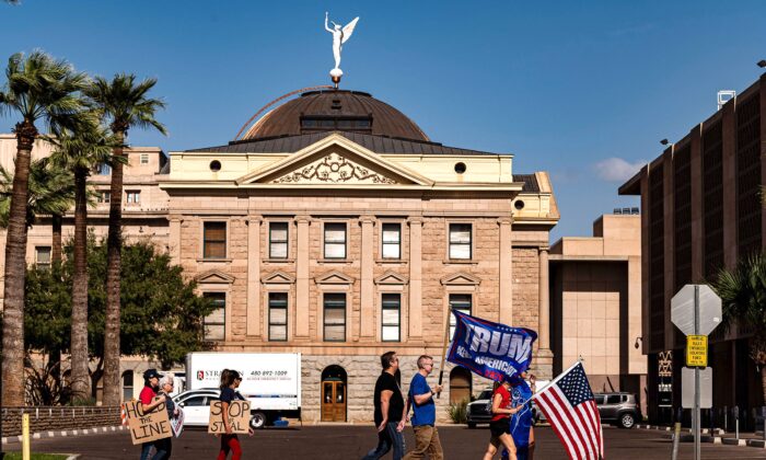 Supporters of President Donald Trump demonstrate in front of the Arizona State Capitol in Phoenix on Nov. 7, 2020. (Olivier Touron/AFP via Getty Images)