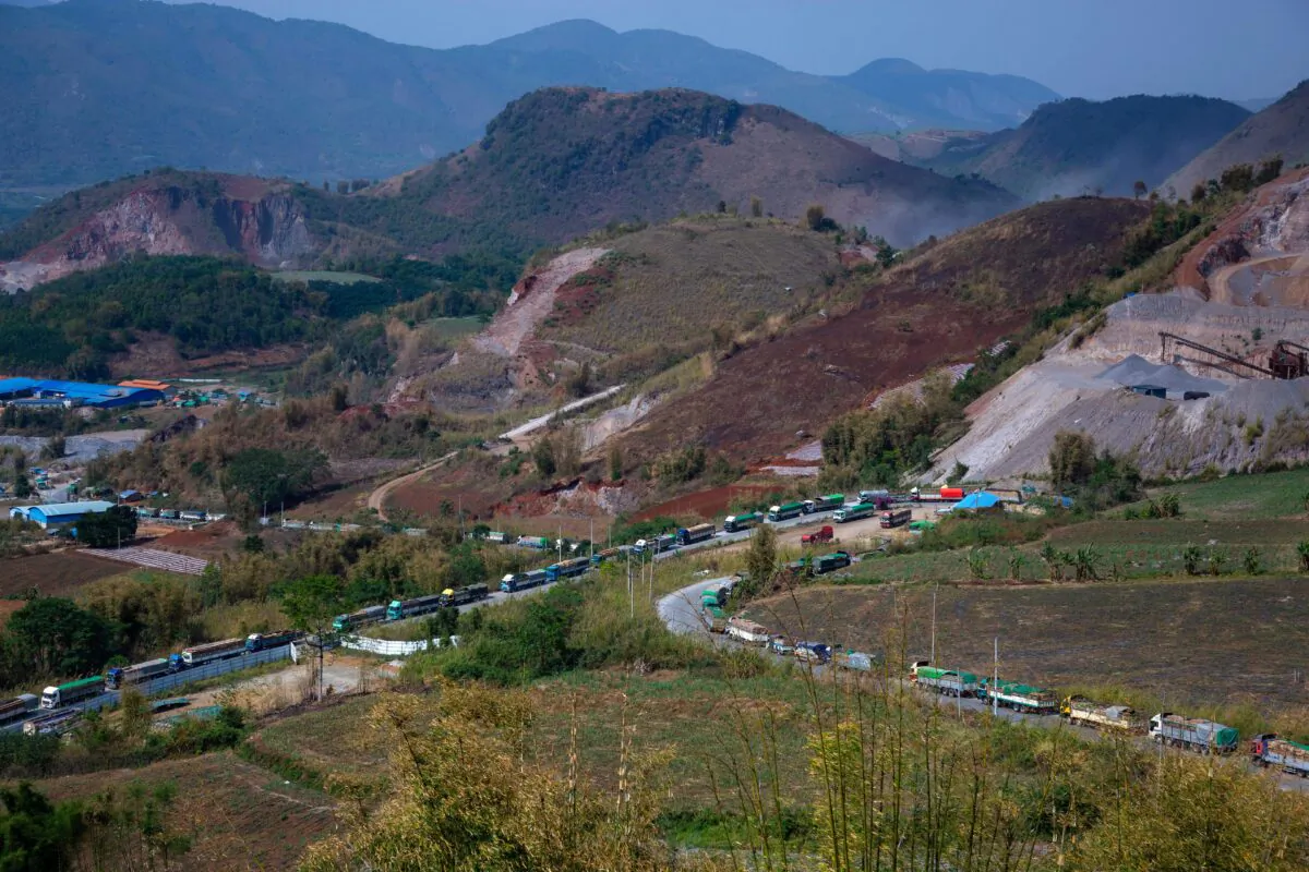 Food trucks wait to enter China near Muse, close to the Chinese border in Shan state, Myanmar on April 20, 2020. (Phyo Maung/AFP via Getty Images)