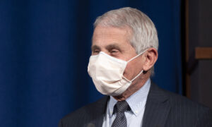 Fauci Says It’s ‘Possible’ Americans Still Need to Wear Masks in 2022