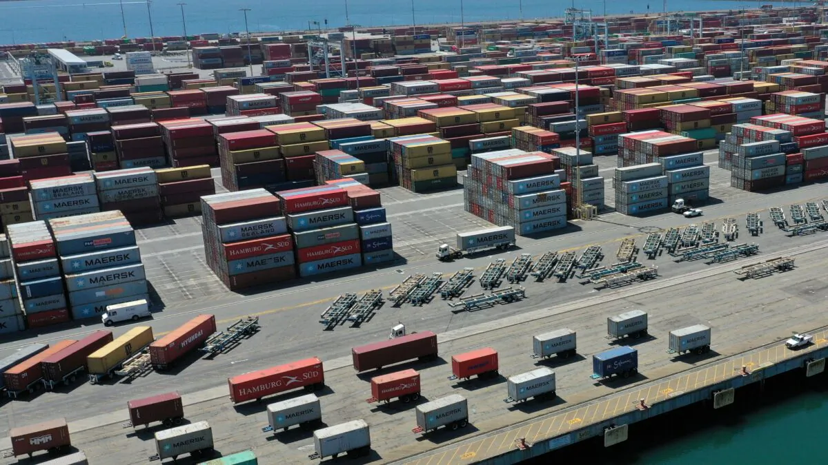 Containers are seen on a shipping dock in the Port of Los Angeles, on April 16, 2020. (Lucy Nicholson/Reuters)