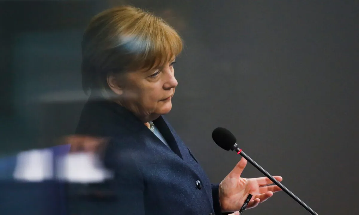 German Chancellor Angela Merkel answers questions of lawmaker about German government's policy at the parliament Bundestag, in Berlin, Germany, on Dec. 16, 2020. (Markus Schreiber/AP Photo)