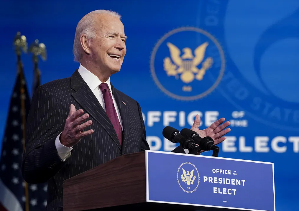 Joe Biden speaks during a news conference at his transition headquarters from a podium labeled “Office of the President Elect” in Wilmington, Del., on Dec. 16, 2020. (Kevin Lamarque/Pool/Getty Images)