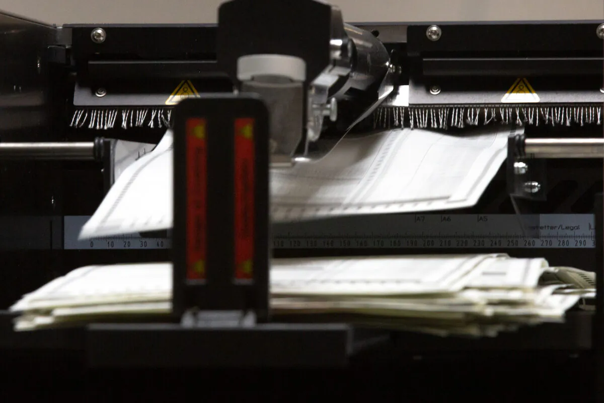 Ballots are counted by Maricopa County Elections Department staff in Phoenix, Ariz., on Oct. 31, 2020. (Courtney Pedroza/Getty Images)