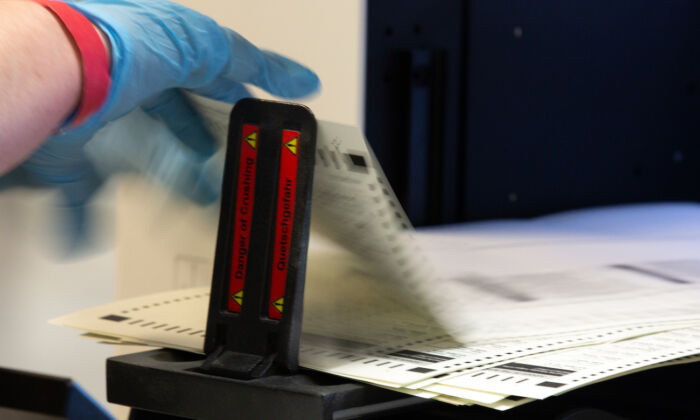 Ballots are counted by Maricopa County Elections Department staff in Phoenix, Ariz., on Oct. 31, 2020. (Courtney Pedroza/Getty Images)