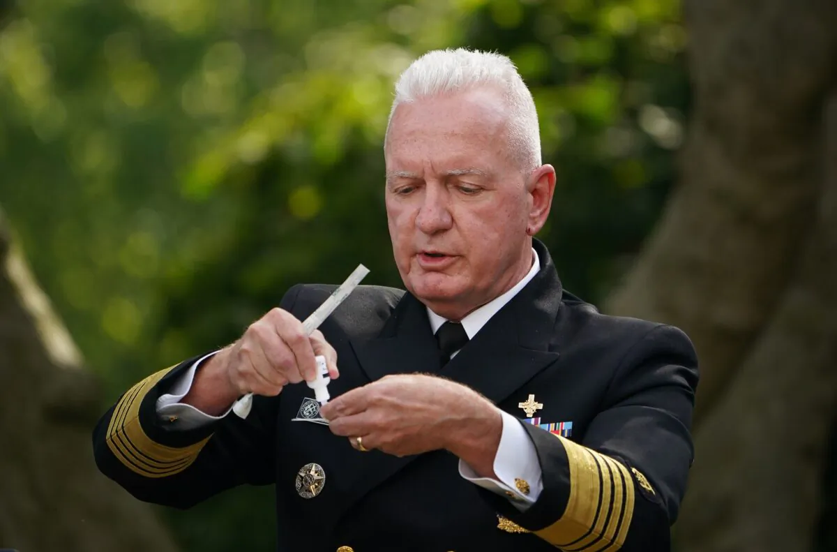 Admiral Brett Giroir, assistant secretary for health, demonstrates a COVID-19 testing kit in Washington on Sept. 28, 2020. (Mandel Ngan/AFP via Getty Images)