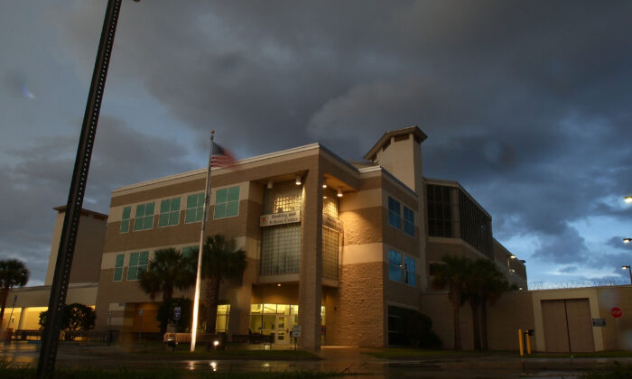 Storm clouds pass over the Booking and Release Center at the Orange County Jail in Orlando, Fla., on July 16, 2011. (Mark Wilson/Getty Images)
