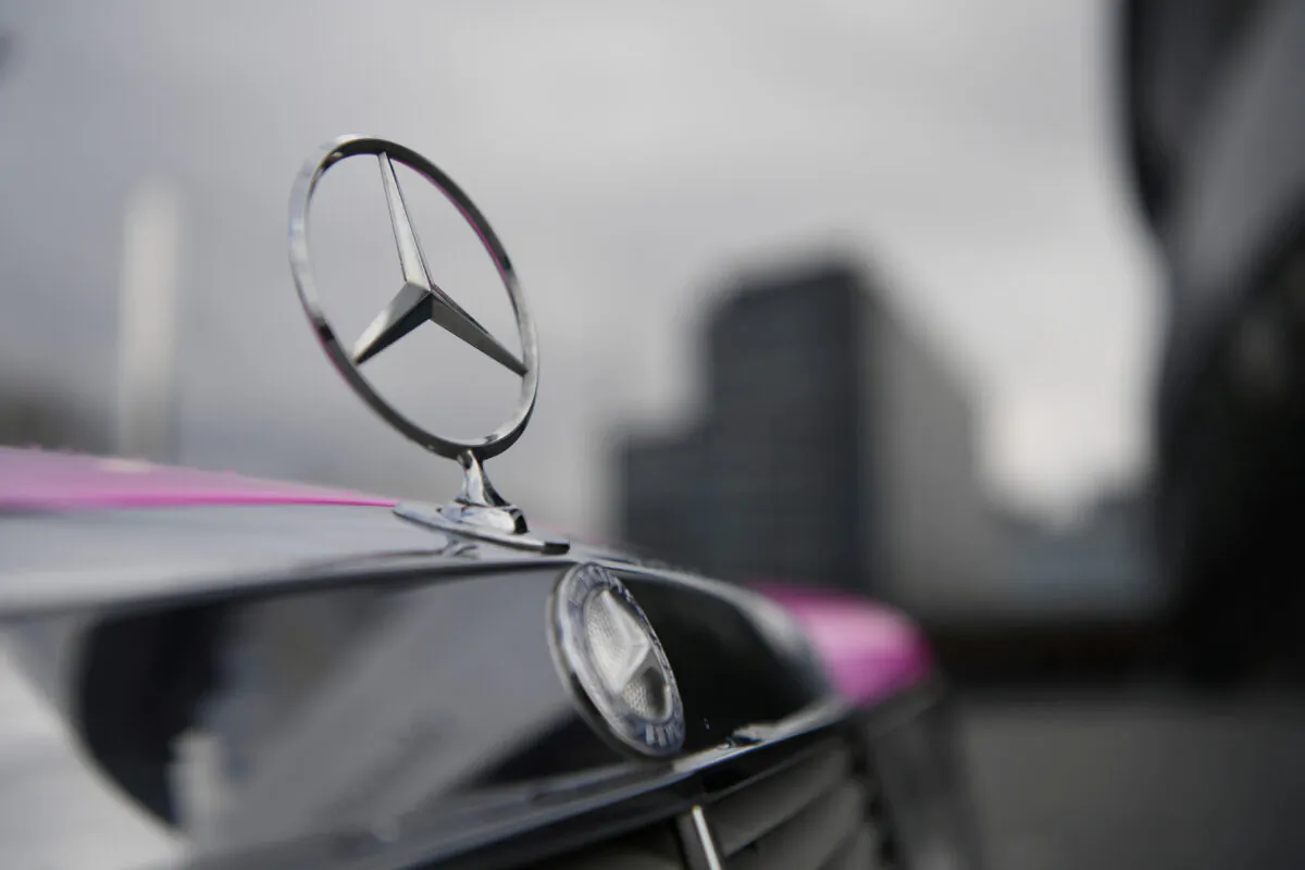 The Mercedes-Benz logo is seen on a car in front of the Mercedes-Benz Museum in Stuttgart, Germany, on Feb. 11, 2020. (Andreas Gebert/Reuters)