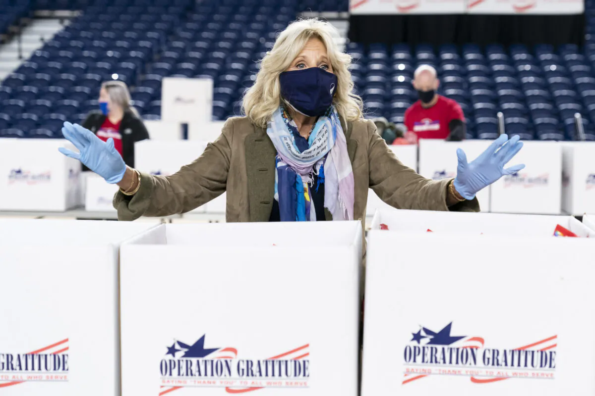 Jill Biden speaks to the media as she assembles care packages for military families for the holiday season in Washington, on Dec. 10, 2020. (Joshua Roberts/Getty Images)