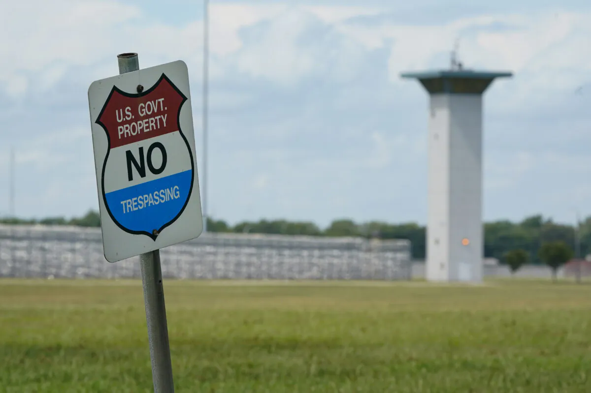 A no trespassing sign is displayed outside the federal prison complex in Terre Haute, Ind., on Aug. 28, 2020. (Michael Conroy/AP Photo)