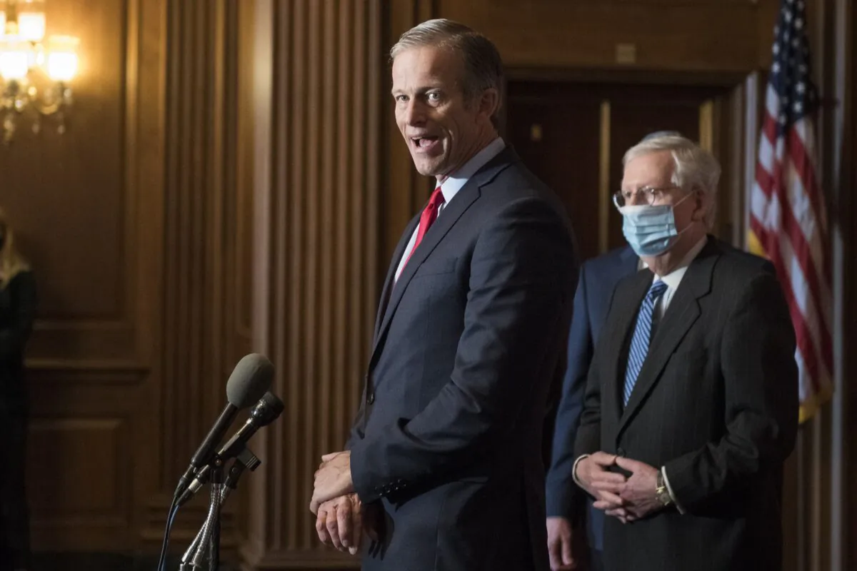 Sen. John Thune (R-S.D.) speaks to reporters in Washington on Dec. 15, 2020. (Rod Lamkey/Pool/AFP via Getty Images)