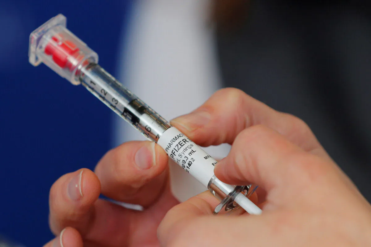 Doses of the Pfizer-BioNTech COVID-19 vaccine are ready to be administered at Brigham and Women's Hospital in Boston on Dec. 16, 2020. (Brian Snyder/Reuters)