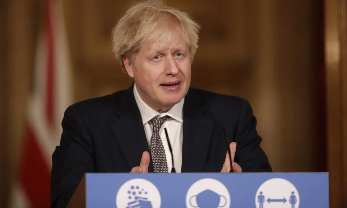 Prime Minister Boris Johnson speaks during a news conference inside 10 Downing Street in London, UK, on Dec. 16, 2020. (Matt Dunham/WPA Pool/Getty Images)