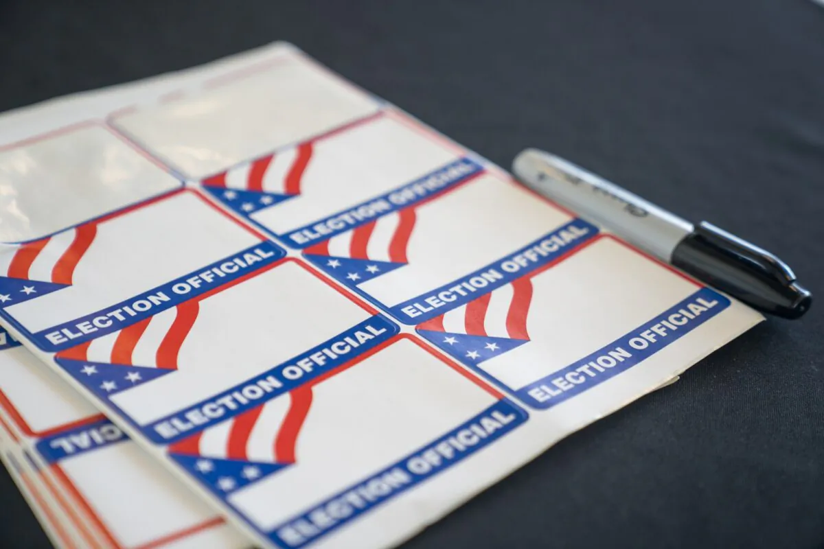 Name tags sit at the entrance of the sorting room where election workers process absentee ballots, at State Farm Arena in Atlanta, Ga., on Nov. 2, 2020. (Megan Varner/Getty Images)