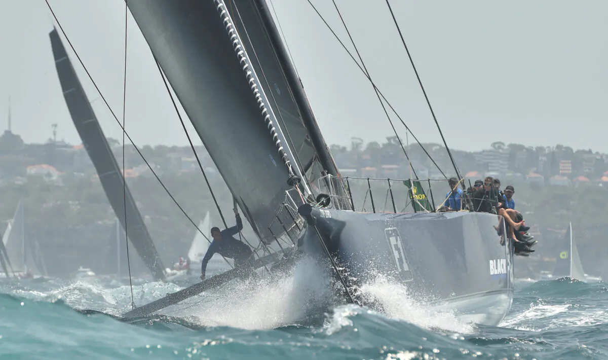 The Monaco RP100 yacht Black Jack sails out of Sydney harbour at the start of the Sydney to Hobart yacht race on Dec. 26, 2019. (Peter Parks/ AFP)