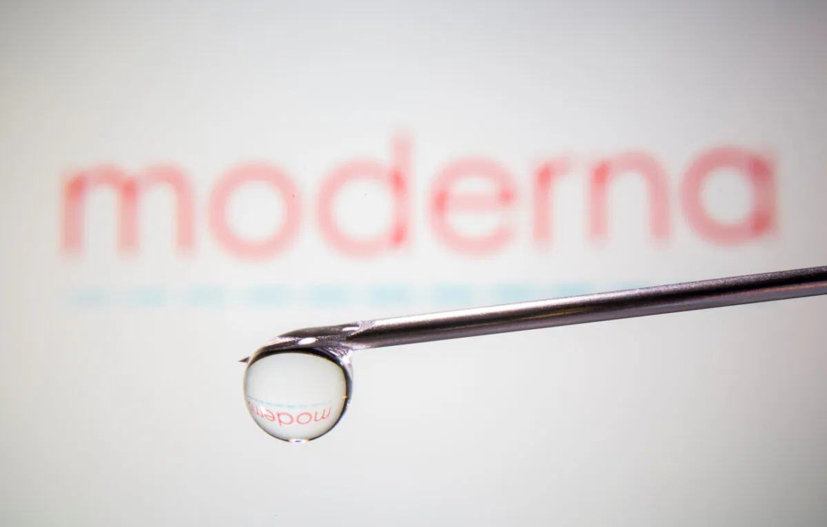 Moderna's logo is reflected in a drop on a syringe needle in this illustration taken Nov. 9, 2020. (Dado Ruvic/Illustration/Reuters)