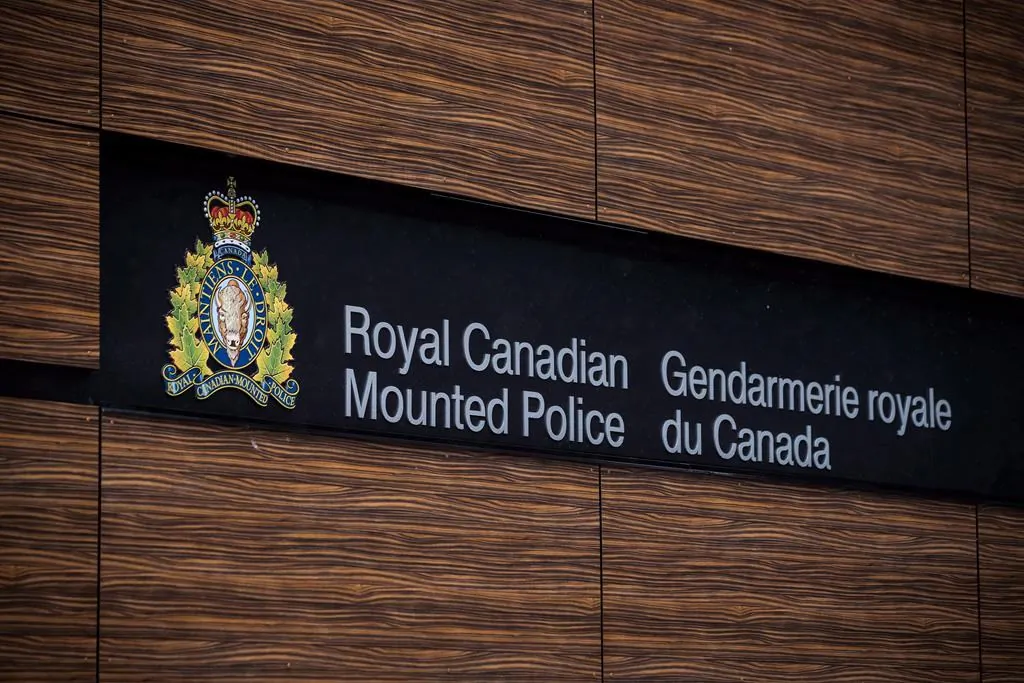 The RCMP logo is seen outside Royal Canadian Mounted Police "E" Division Headquarters, in Surrey, B.C. on April 13, 2018. (The Canadian Press/Darryl Dyck)