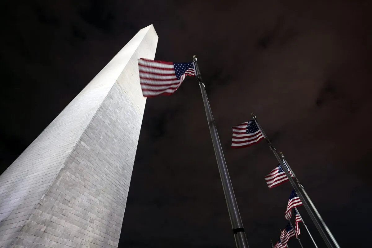 American flags fly around the Washington Monument in Washington on Dec. 18, 2020. (Manuel Balce Ceneta/AP Photo)