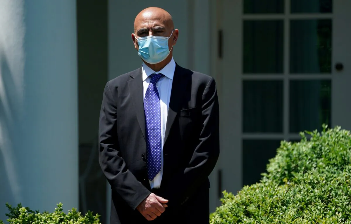 Former GlaxoSmithKline pharmaceutical executive Moncef Slaoui, now President Donald Trump administration's vaccine czar, stands outside the White House in Washington on May 15, 2020. (Kevin Lamarque/Reuters)