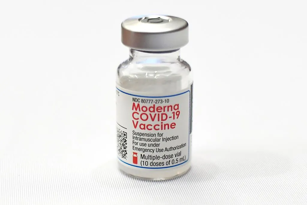 A vial of Moderna's COVID-19 vaccine is seen at Hartford Hospital on Dec. 21, 2020, in Hartford, Conn. (AP Photo/Jessica Hill)