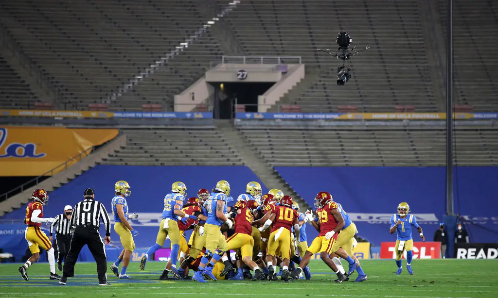 The University of Southern California (USC) Trojans and the University of California–Los Angeles (UCLA) Bruins play in a cross-town rivalry game to no fans at the Rose Bowl in Pasadena, Calif., on Dec. 12, 2020. (Sean M. Haffey/Getty Images)