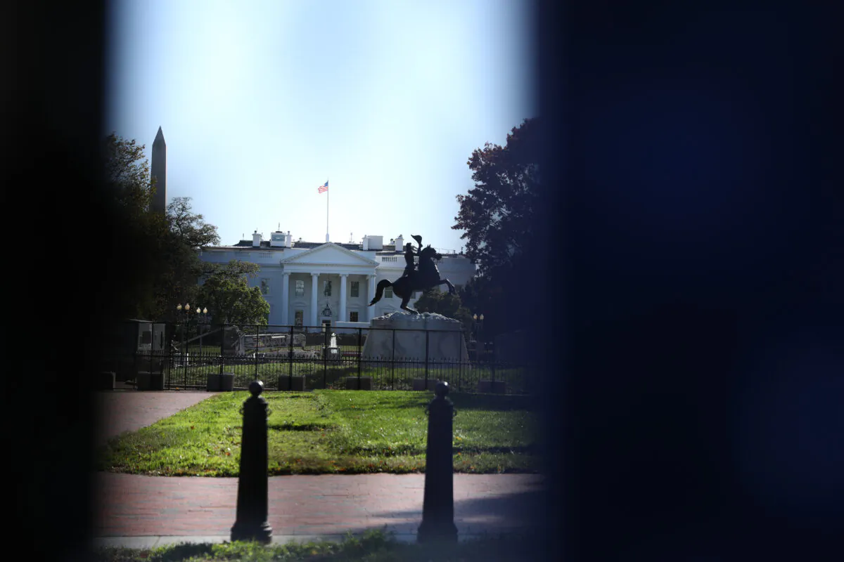 The White House, seen through a fence on H Street by Lafayette Square, on Nov. 2, 2020. (Charlotte Cuthbertson/The Epoch Times)