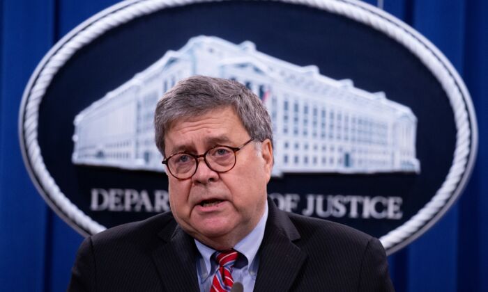 Then-Attorney General William Barr participates in a news conference at the Department of Justice in Washington on Dec. 21, 2020. (Michael Reynolds/Pool via Reuters)