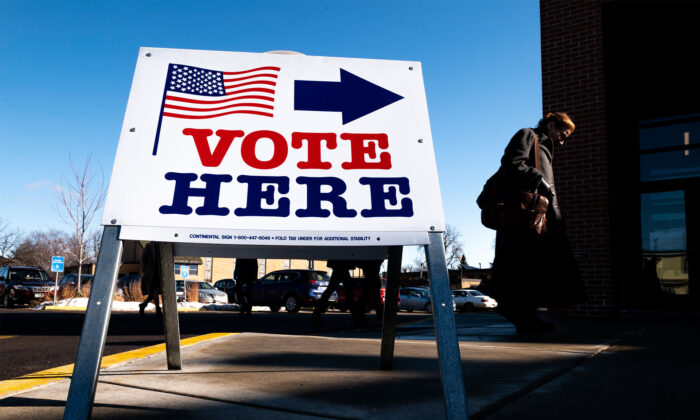 A voter arrives at a polling place in Minneapolis, on March 3, 2020. (Stephen Maturen/Getty Images)