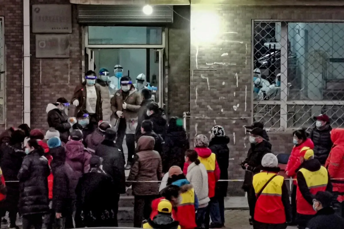 Residents line up for COVID-19 tests in Dalian, China, on Dec. 22, 2020. (STR/AFP via Getty Images)