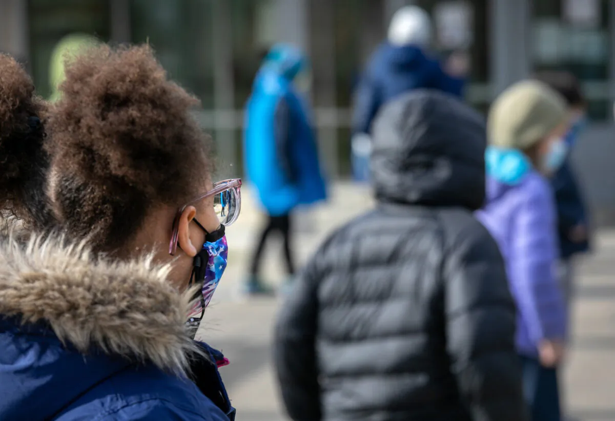 A child wears a mask at Rogers International School in Stamford, Connecticut, on Nov. 19, 2020. (John Moore/Getty Images)