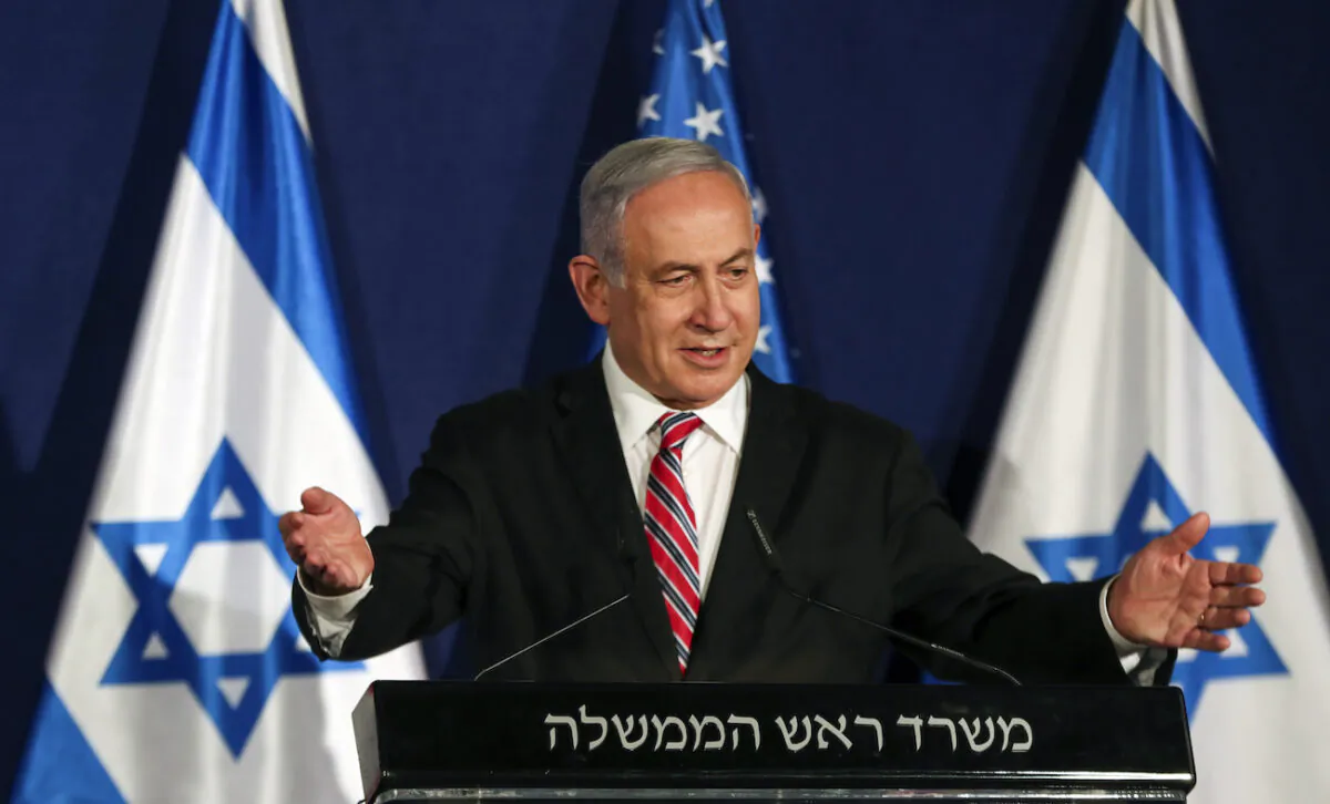 Israeli Prime Minister Benjamin Netanyahu speaks during a news conference with White House senior adviser Jared Kushner (not pictured), in Jerusalem, Israel, on Dec. 21, 2020. (Ronen Zvulun/Pool/Reuters)