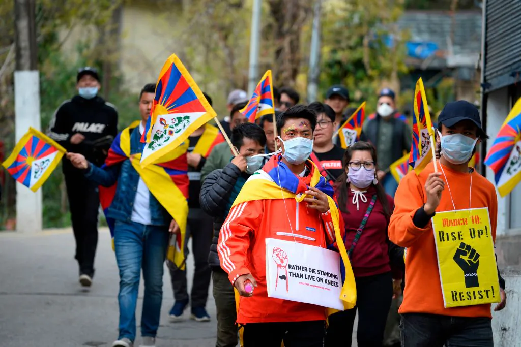Tibetans living in exile take part in a protest march from McLeod Ganj to Dharamshala to mark the 61st anniversary of the Tibetan Uprising Day that commemorates the 1959 Tibetan uprising, in McLeod Ganj, India on March 10, 2020. (Sajjad Hussain/AFP via Getty Images)