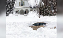 Motorist Rescued After 10 Hours in Car Buried by Snow Plow