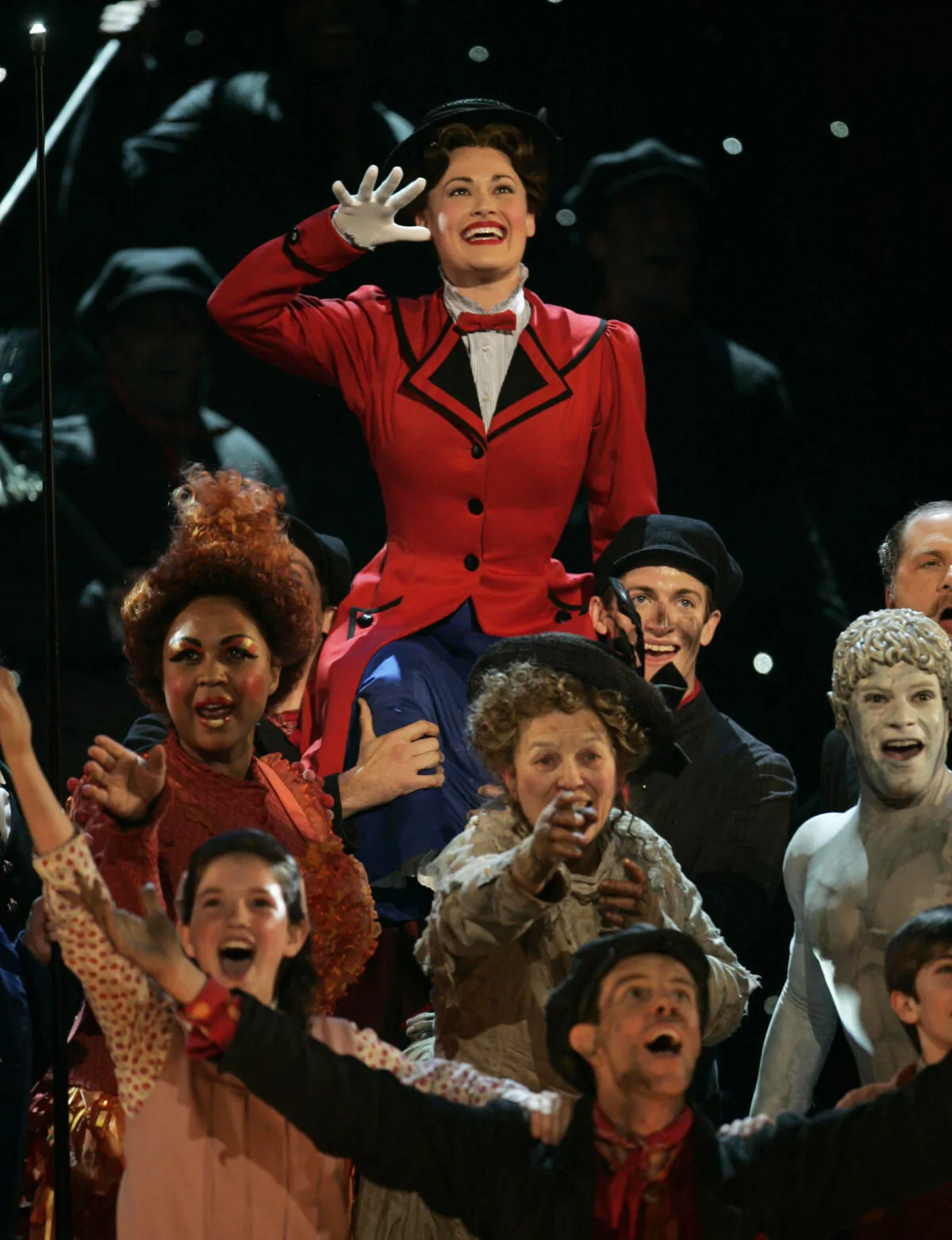 Rebecca Luker, background, leads a performance of songs from "Mary Poppins" at the 61st Annual Tony Awards in New York on June 10, 2007.  (Jeff Christensen/AP Photo File)
