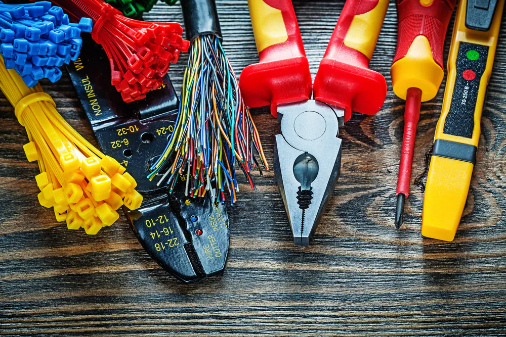 Remember that you are liable for any electrical work you do for as long as it exists. (mihalec/Shutterstock)